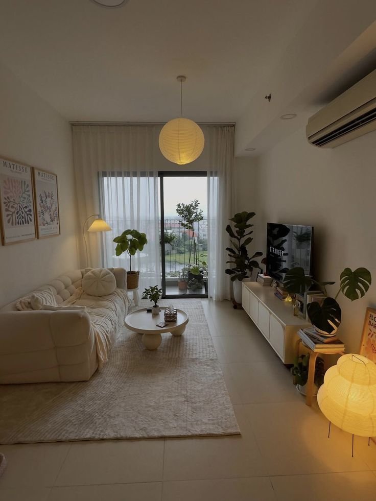 How to Arrange Furniture in a Long Narrow Living Room Without Making It Feel Like a Hallway download (55)